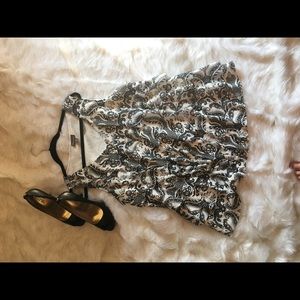 Black and white sleeveless tiered top